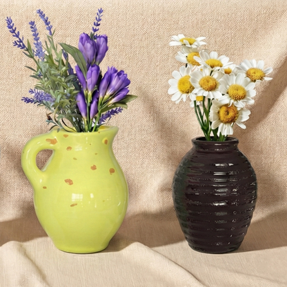 close up image of 3D mini flower pot fridge magnets with colorful artificial flowers on a table