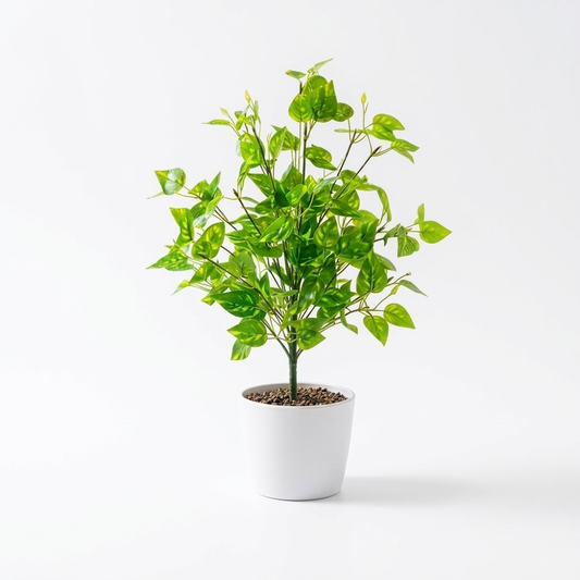 A vibrant artificial green leafy plant shown against a clean, solid white background. Pot not included.