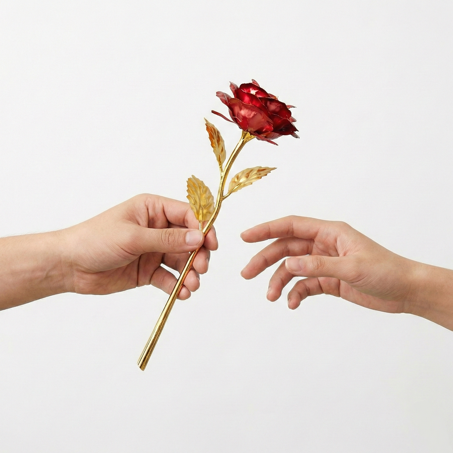 Full view of a 24K artificial golden rose with red petals, detailed stem and leaves.