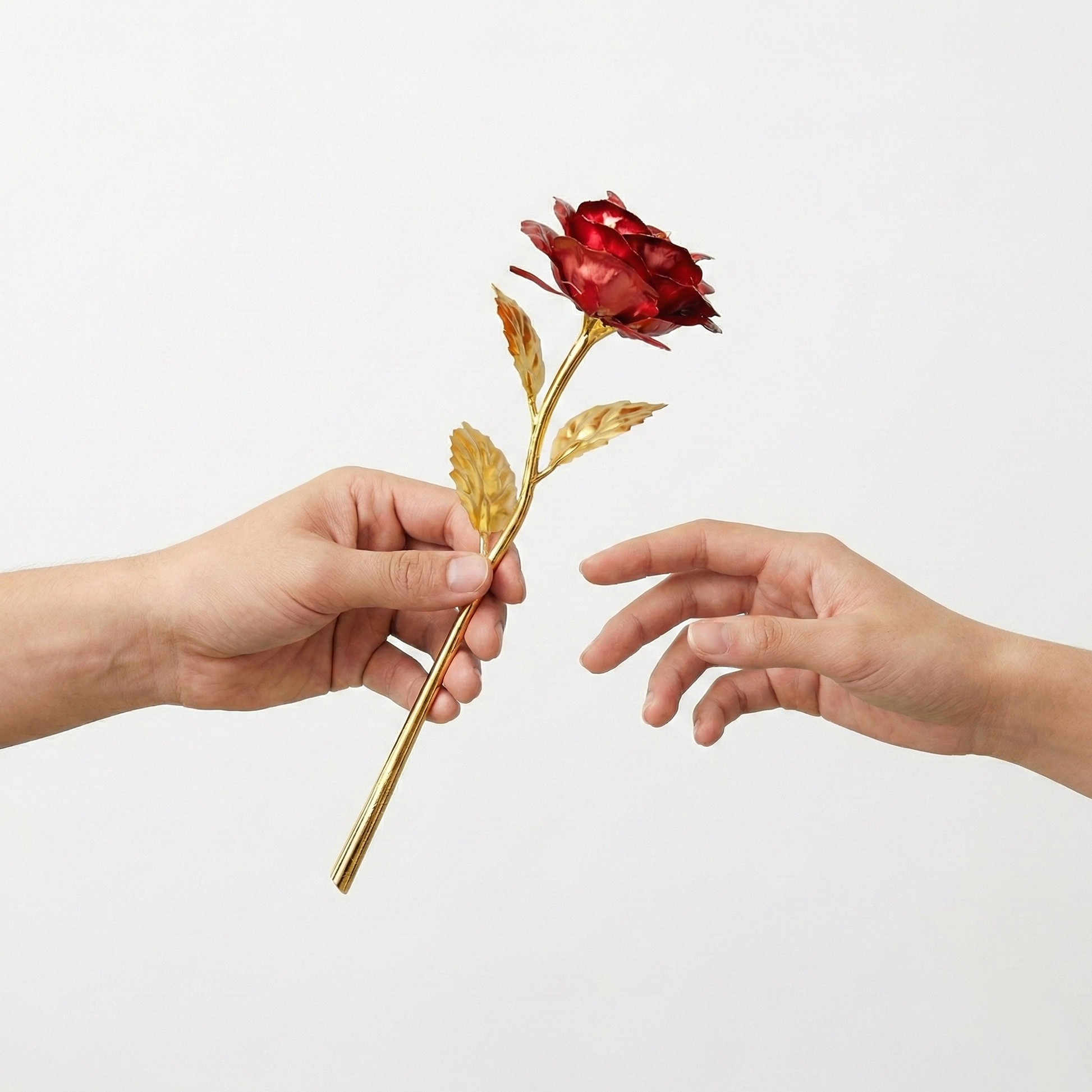 Full view of a 24K artificial golden rose with red petals, detailed stem and leaves.