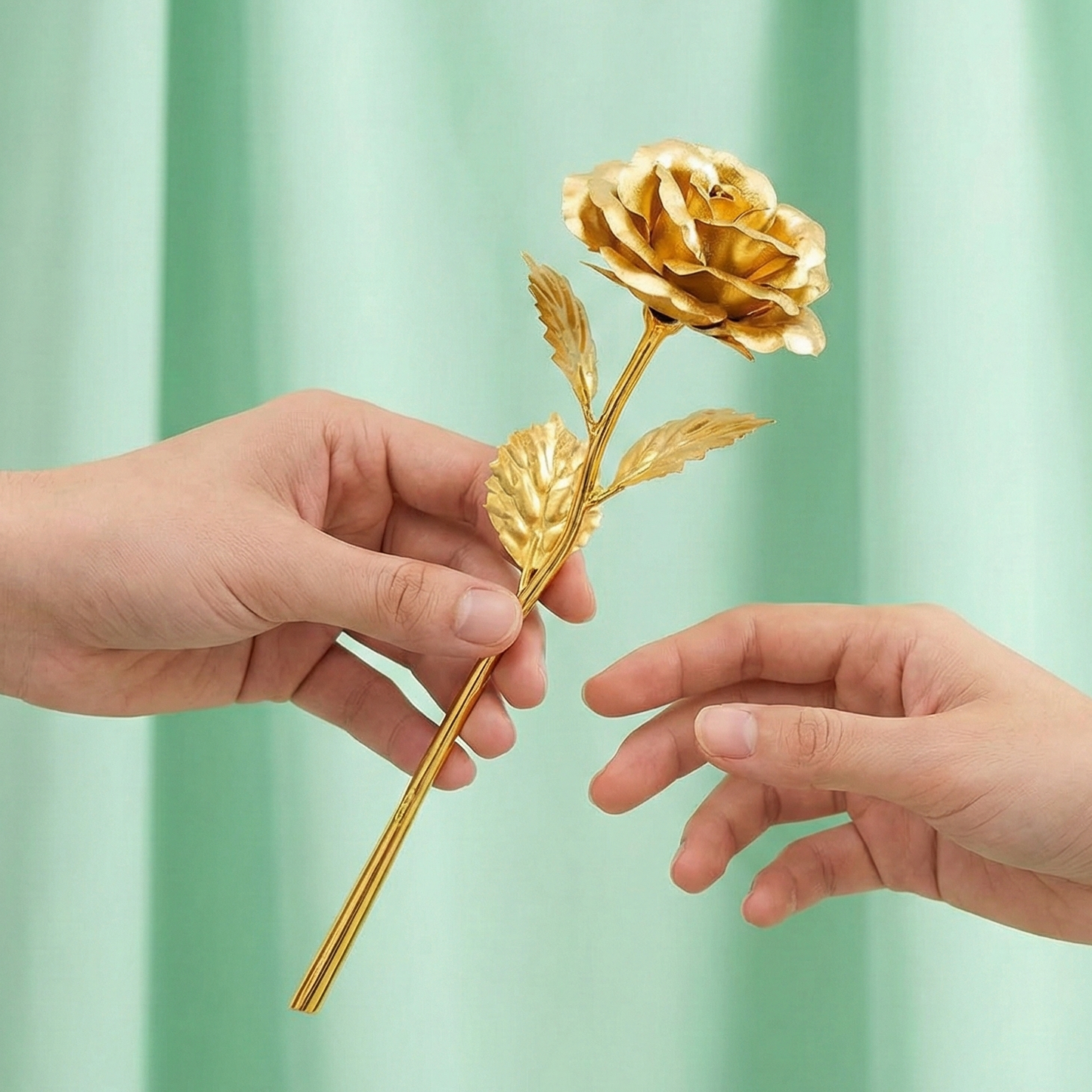 Full view of a 24K artificial golden rose with detailed stem and leaves
