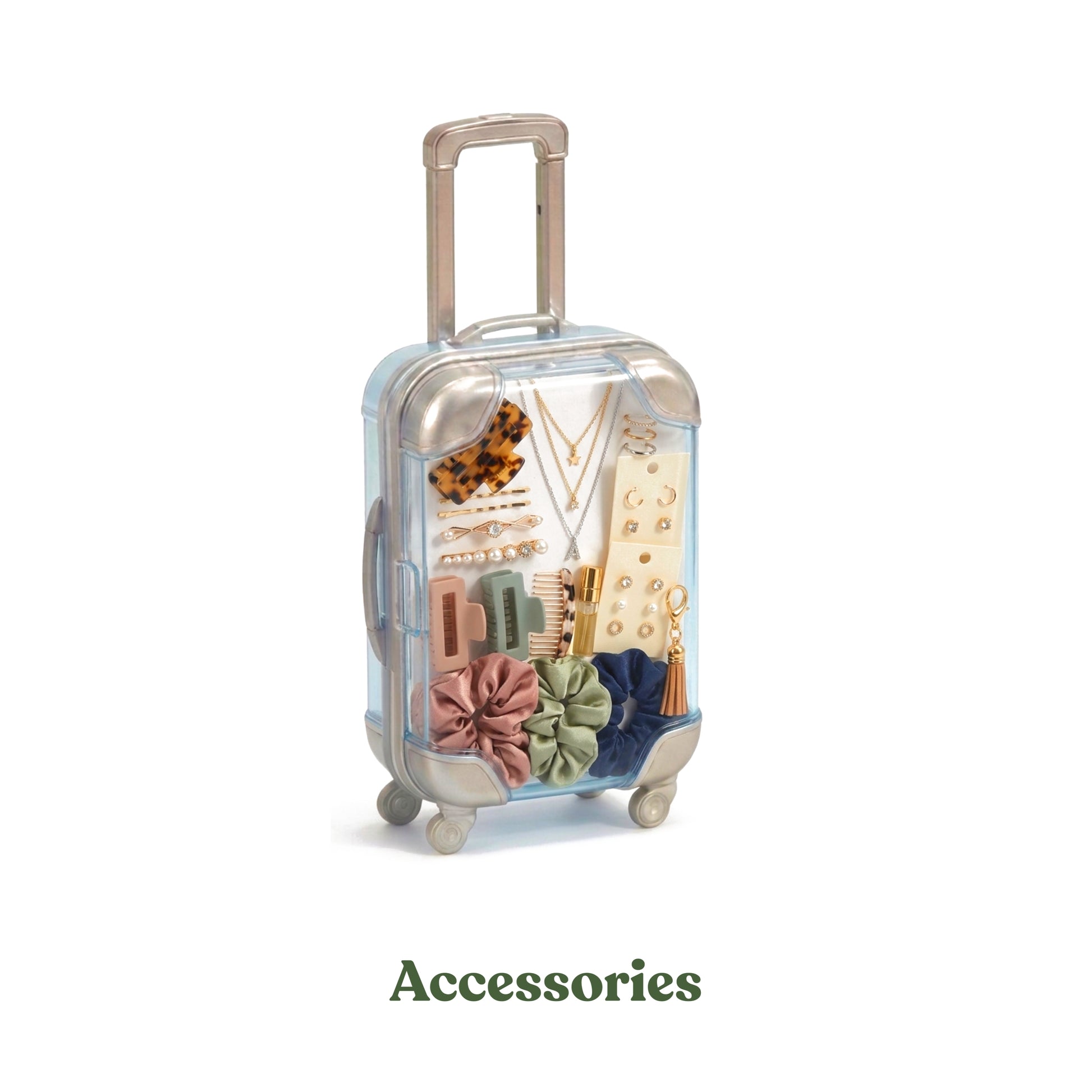 Small blue travel jewelry organizer shaped like a miniature suitcase holding gold rings, earrings, and a chain.